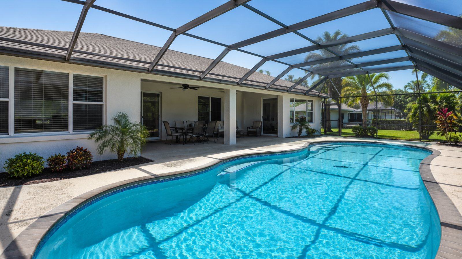A residential backyard pool in Lehigh Acres, Florida