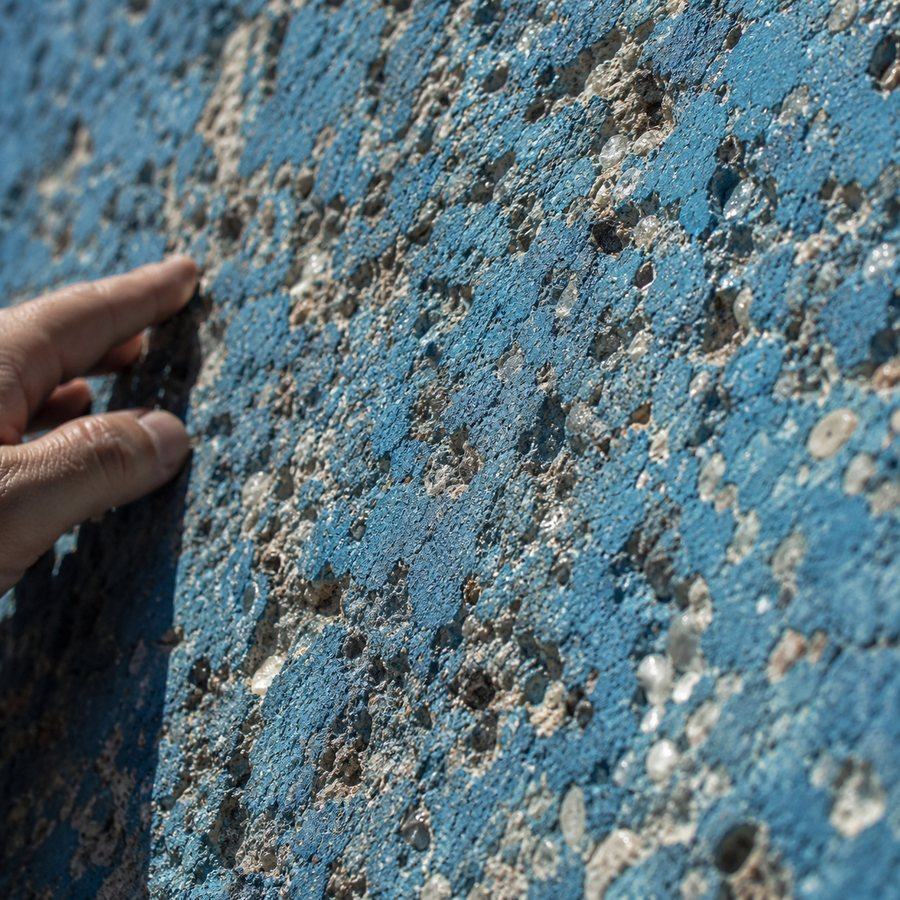 Rough, sandpaper-like texture